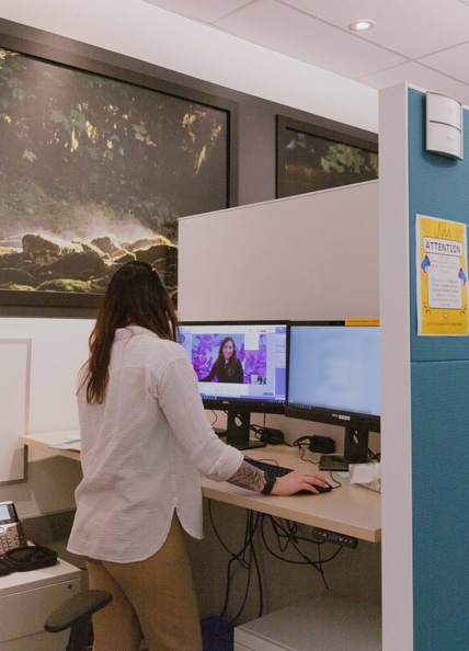 A Fraser Health nurse helping a patient virtually.